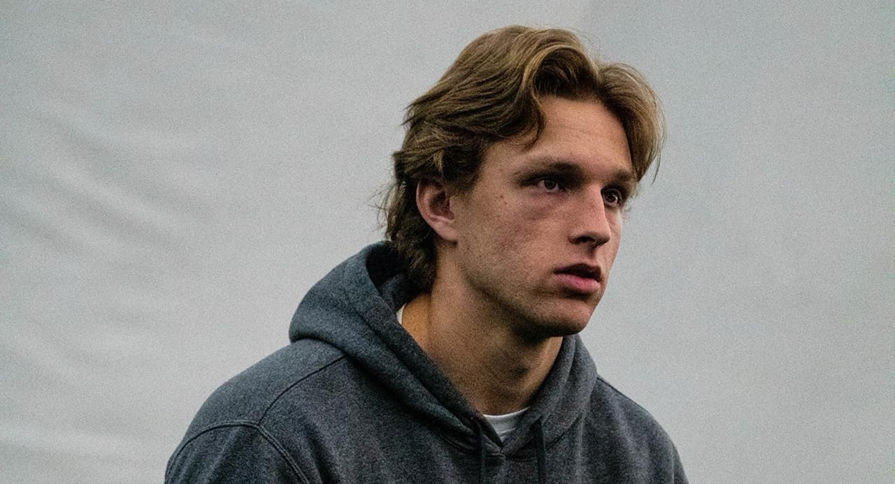 Mark Gronowski throwing a football